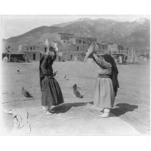    Taos Indians,Native Americans,winnowing grain,c1929
