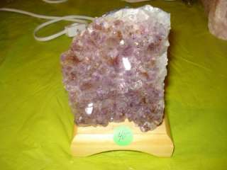 Natural Amethyst Crystal Gemstone Cluster Lamp On Wood  