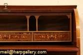 this exquisite 1950 s marquetry desk with a cylinder or barrel roll 