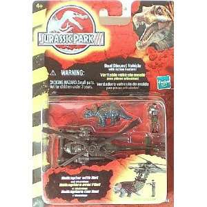   : Jurassic Park III Helicopter with Net and Triceratops: Toys & Games