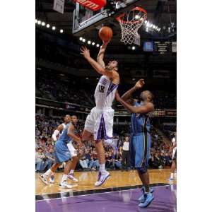  Washington Wizards v Sacramento Kings: Omri Casspi and 