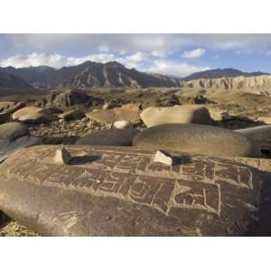  Close Up of Traditional Carved Prayer Stones on a Prayer 