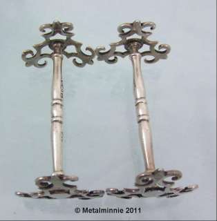 pair of traditionally styled solid silver Victorian knife rests in 