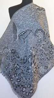 motif of butterflies gives this shawl a light hearted attitude.