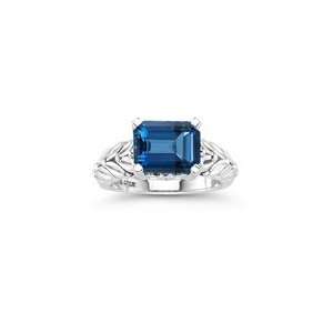 04 Cts Diamond & 3.24 Cts London Blue Topaz Solitaire Ring in Silver 