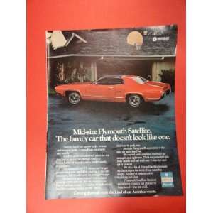 1972 Plymouth Satellite print Ad (red car/garage.) Orinigal Vintage 
