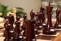   chess set boxwood blood rosewood on superior traditional chessboard