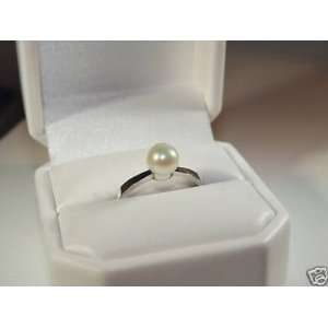   PEARL RING SET IN NON TARNISH STERLING SILVER SETTING 