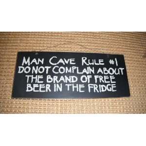 Sign:Man Cave Rule #1 Do not complain about the brand of free beer in 