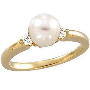  Exclusive Cultured Pearl & Diamond Ring set in 14 karat 