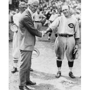 1922 photo Judge Kenesaw Mountain Landis shakes hands with 