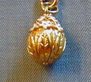 JOAN RIVERS CHARMS    ALMOST TEARDROP SHAPE FLORAL CHARM  